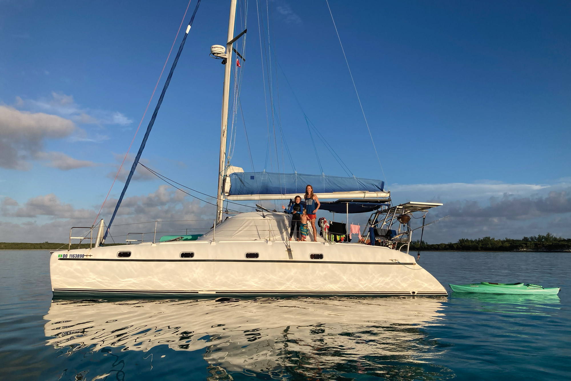 Brianna Randall and her children aboard catamaran in Bahamas